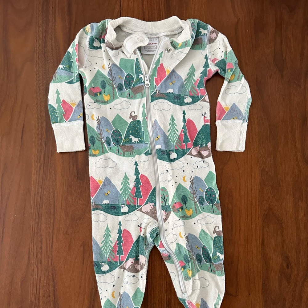 Hanna Andersson footie pajamas w mountain goat landscape pattern. 6-12 months